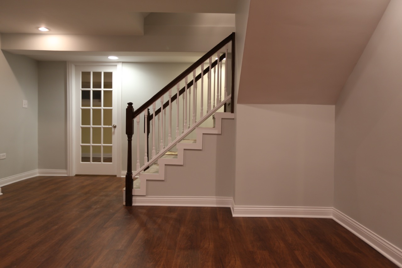 Stairs to a basement family room