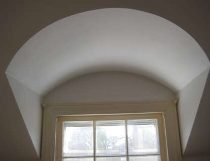 Plaster arched window opening